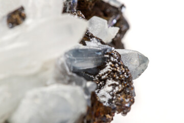 Macro mineral stone Drusus quartz with sphalerite in the rock a white background