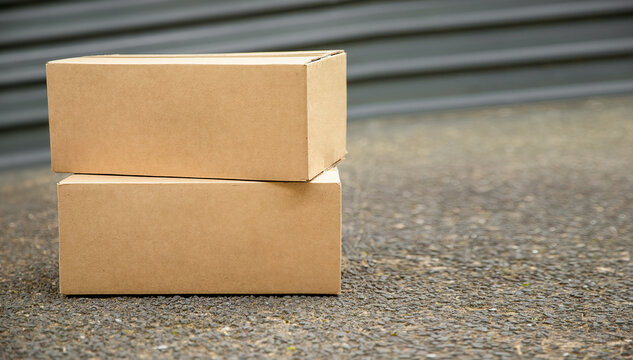 cardboard boxes delivered to the forn door and left outside for contactless pickup, delivery for online shopping, contact-free delivery and pickup due to COVID-19. High quality photo