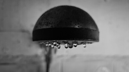 The Water scarcity. Old shower. Water supply problems.