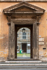 Fototapeta na wymiar Entrance door of the Archivio di Stato di Roma (Rome State Archives in Rome) in Corso del Rinascimento.