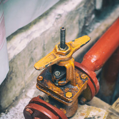 Industrial valve on a gas supply or heating system pipe. Selective Focus