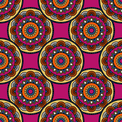 Abstract seamless mandala background. Texture in pink and yellow colors. Oriental pattern for design, fashion print, scrapbooking