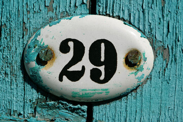 House door number plate twenty nine