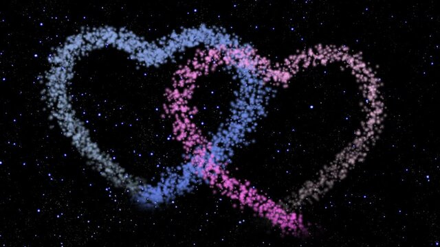 Animation of the appearance of two lovers' hearts from the stardust of a comet in a dark sparkling starry sky. The blue and purple hearts are united in love. Love, heart and Valentine's Day.