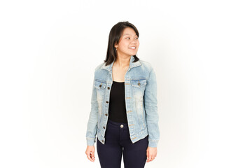 Looking Aside of Beautiful Asian Woman Wearing Jeans Jacket and black shirt Isolated On White Background