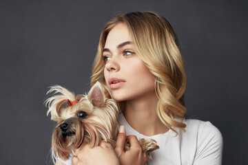 beautiful woman with a small dog makeup posing cropped view
