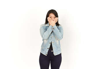 Fototapeta premium Covering Mouth of Beautiful Asian Woman Wearing Jeans Jacket and black shirt Isolated On White Background