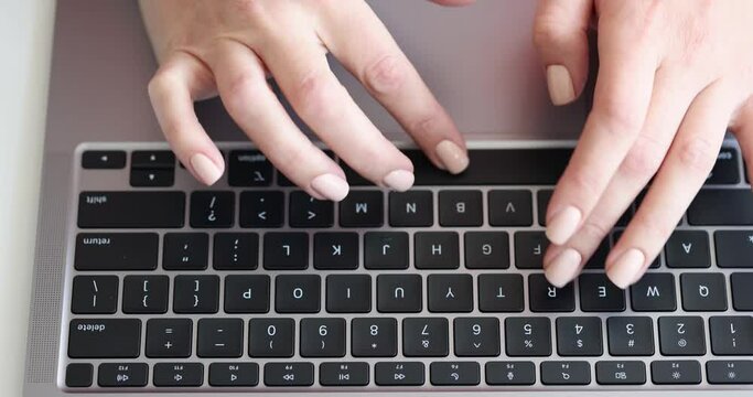 Female hands typing on laptop keyboard 4k movie