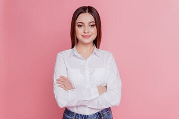 Fototapeta premium Photo of young attractive business woman confident crossed hands isolated over pink color background