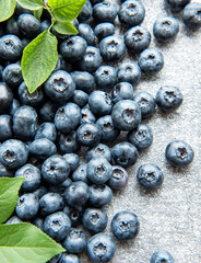 Blueberries on concrete background