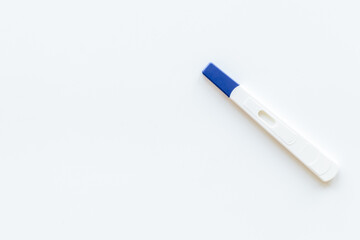 Pregnancy test top view. Pregnancy and female health care concept