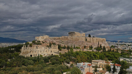Obraz premium Aerial drone photo of Masterpiece Acropolis hill and the Parthenon on a beautiful cloudy morning, Athens, Attica, Greece