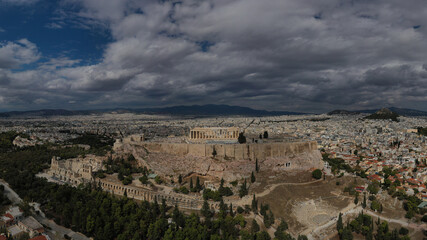 Fototapeta na wymiar Aerial drone photo of Masterpiece Acropolis hill and the Parthenon on a beautiful cloudy morning, Athens, Attica, Greece