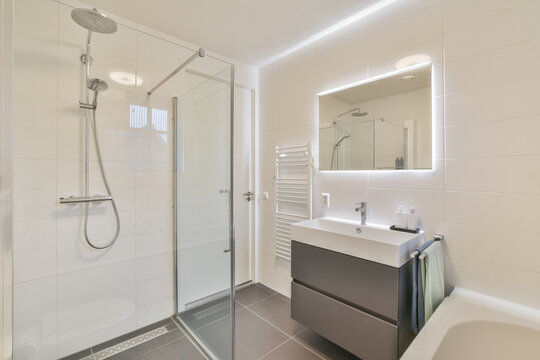 Interior of bathroom with glass wall