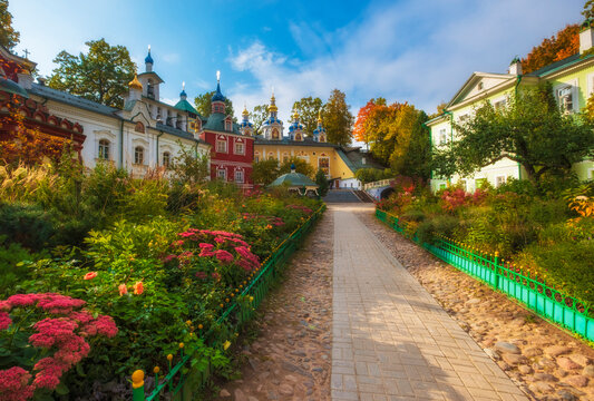 beautiful churches in the Dormition Pskovo Pechersky Monastery in the city of Pechery, Pskov Region, Russia during the golden autumn