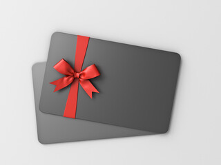 Black gift card with red ribbon and bow isolated on white background with shadow minimal concept 3D rendering