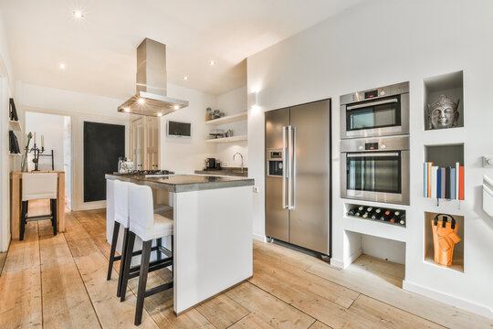 Modern kitchen interior with built in electric appliances