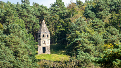 An old watchtower in the middle of the forest