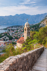 Fototapeta na wymiar The Church of Our Lady of Remedy is a Roman Catholic church located in Kotor, Montenegro, belonging to the Roman Catholic Diocese of Kotor. The church is perched on the slope of St. John Mountain 