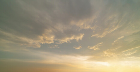 Sunset sky. Abstract nature background. Dramatic blue with orange colorful clouds in twilight time.