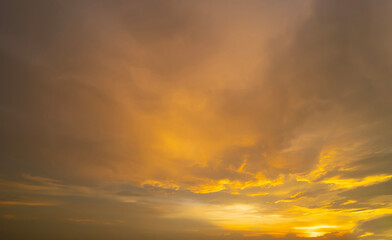 Sunset sky. Abstract nature background. Dramatic blue with orange colorful clouds in twilight time.