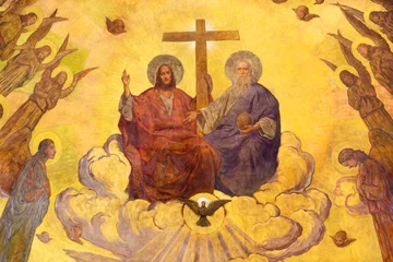 Foto op Canvas VIENNA, AUSTIRA - JUNI 18, 2021: The detail of fresco of Holy Trinity among the angels in the main apse of Herz Jesu church from begin of 20. cent. by autor with F.Z. initials. © Renáta Sedmáková
