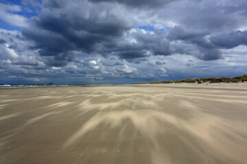 Fototapeta na wymiar Sand beach on island Ameland, Dutch