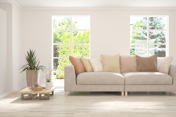 Minimalist living room in white color with sofa and summer landscape in window. Scandinavian interior design. 3D illustration