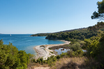 Fototapeta na wymiar Amazing scenery by the sea in Erimitis forest, north-east Corfu, Greece