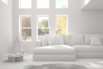 Stylish room in white color with sofa and autumn landscape in window. Scandinavian interior design. 3D illustration