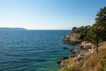 Fototapeta na wymiar Amazing scenery by the sea in Kassiopi, north-east Corfu, Greece
