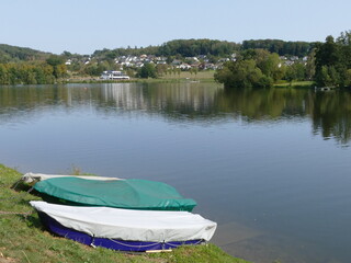 Rowing boats at the pre-storage basin of the Sorpe Lake, North Rhine-Westphalia, Germany