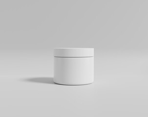 A round white plastic cream bottle
