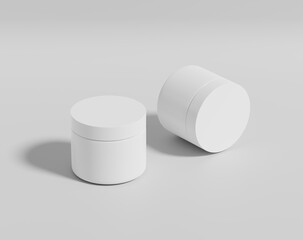 A round white plastic cream bottle