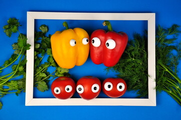 The concept of healthy eating. Sweet bell pepper and tomatoes with dill and cilantro.