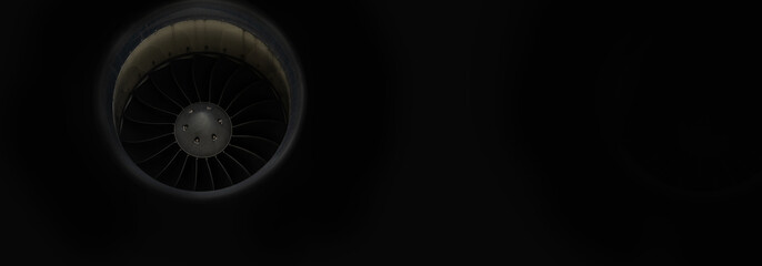 The turbine engine of the modern business jet aircraft, rotor close-up over black background, panoramic layout