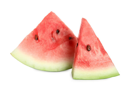 Slices of delicious ripe watermelon on white background