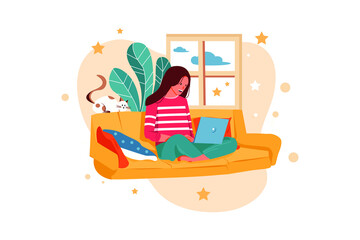 Woman with laptop at home sitting on sofa typing