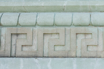 Concrete wall background with geometric pattern design. Ornamentation. Texture background