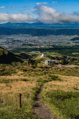 Scenic high angle view on Aso town, abandoned buildings, and walk way from mountain Aso in Kyushu, Japan