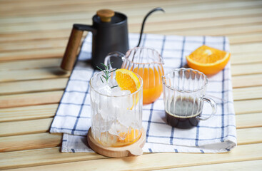 drinking preparing of making orange americano coffee in free time of people living life