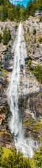 Obraz premium High resolution stitched panorama of a beautiful alpine summer view at the famous Fallbach waterfall, the highest waterfall in Kaernten, Maltatal, Austria