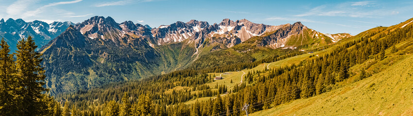 High resolution stitched panorama of a beautiful alpine summer view with the Kleinwalsertal in the...