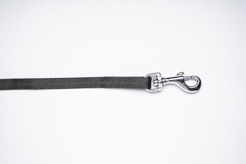 Dog leash with carabiner on a white background, top view.