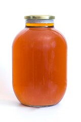 three liters of homemade beer in a glass jar