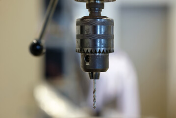 Drill of a milling machine closeup, selective focus