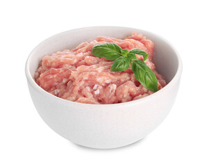 Raw chicken minced meat with basil in bowl on white background