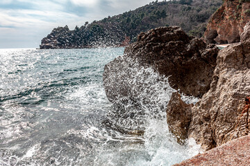 Waves Splashing Over the Rocks 