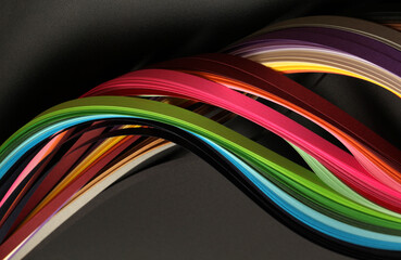 Rainbow color strip wave paper. Abstract texture horizontal black background.