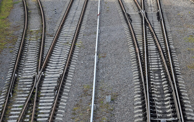 Four intersecting railway lines on gravel